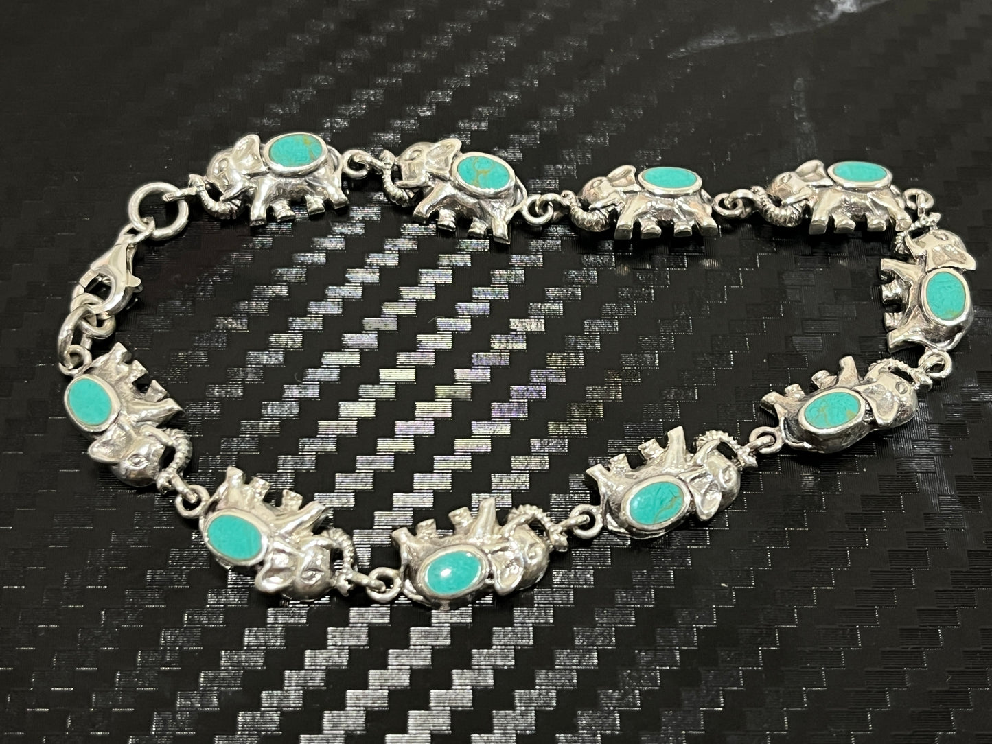 小丞飾 泰國純銀礦石大象手鏈 $1690  大象手鏈男女都適合 ，總長19公分，小手圍可以客製化拿幾顆大象-  #B601025 
藍色藍松石
黑色黑瑪瑙
白色白玉髓 
紅色紅碧玉
七彩鮑魚
綠藍綠松石