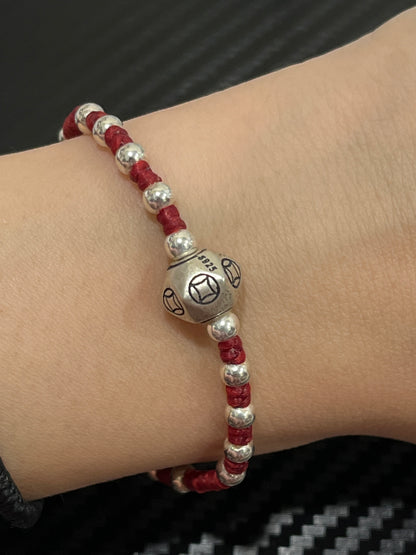 小丞飾 銅錢轉運珠珠蠟繩紅繩 17+3公分 $1290。 B601118