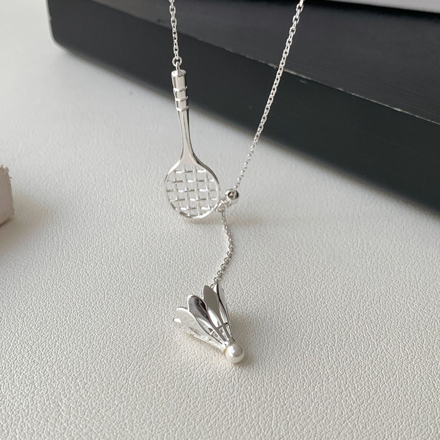 小丞飾
S925純銀羽毛球拍抽拉項鍊女韓國小眾設計高級感復古小紅書鎖骨鏈 
羽球🏸的頭是珍珠喔 很可愛 
50+3+3公分
$1490   N601035