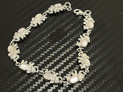 小丞飾 泰國純銀礦石大象手鏈 $1690  大象手鏈男女都適合 ，總長19公分，小手圍可以客製化拿幾顆大象-  #B601025 
藍色藍松石
黑色黑瑪瑙
白色白玉髓 
紅色紅碧玉
七彩鮑魚
綠藍綠松石